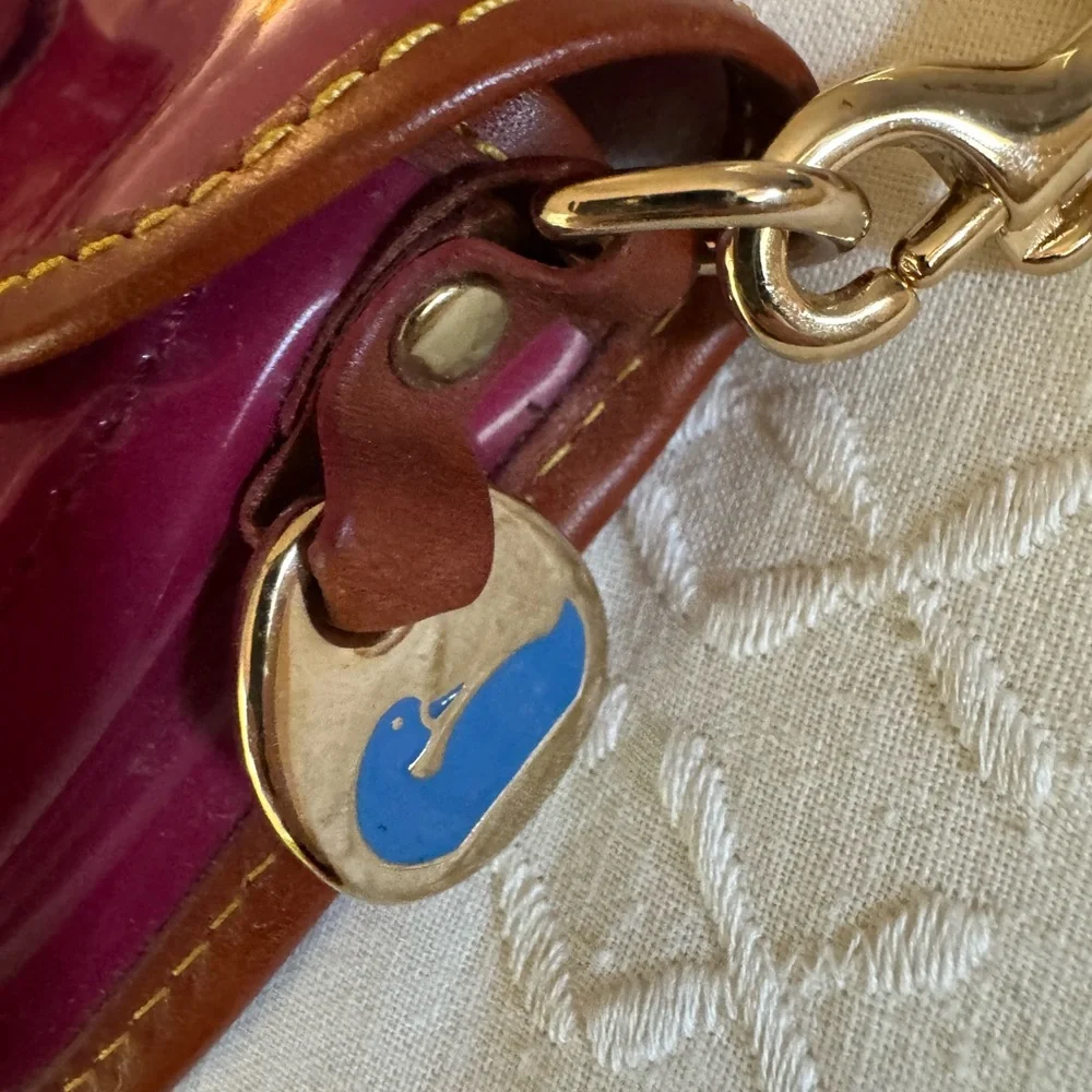 Dooney & Bourke Red and Brown Leather Wristlet with Gold Accents